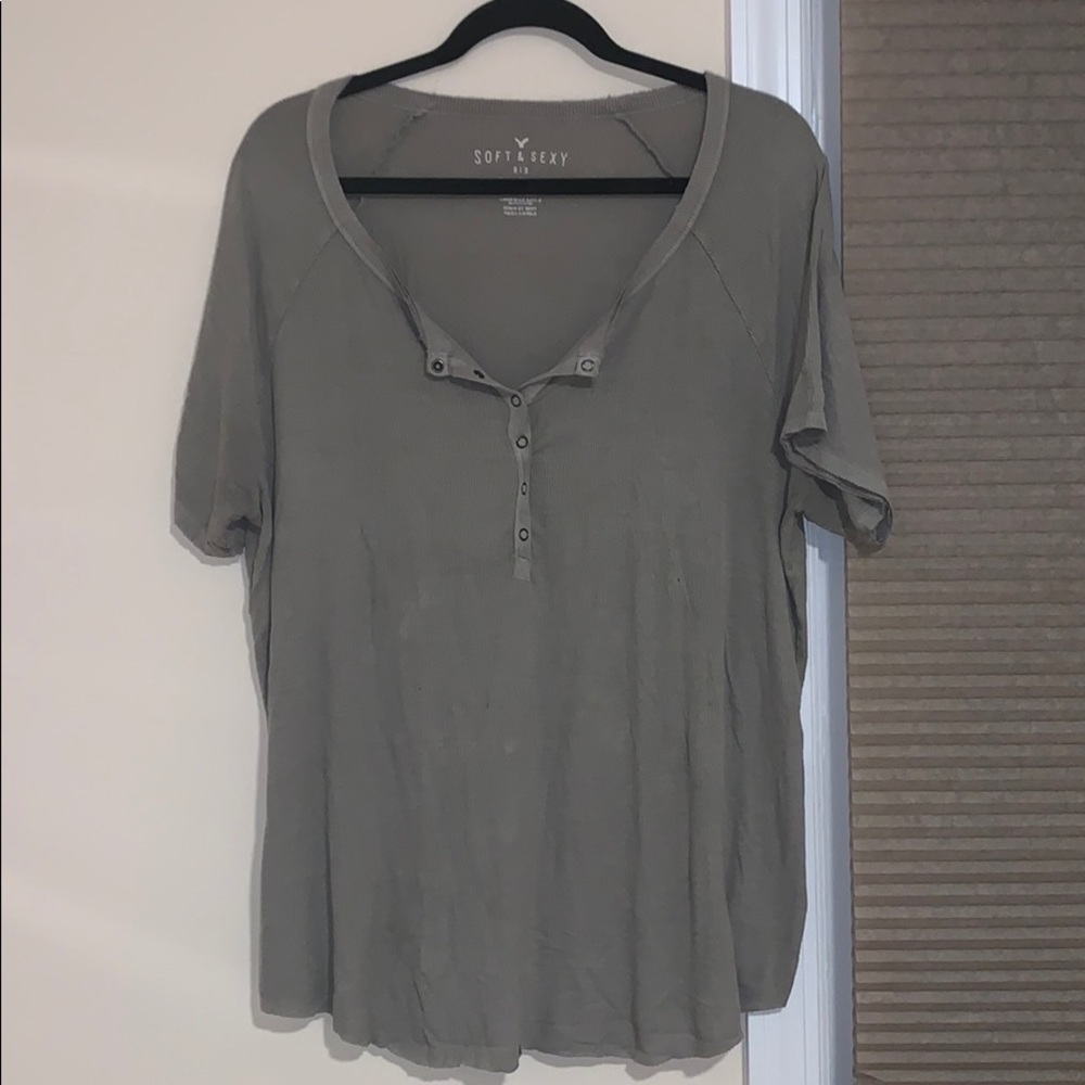 green buttoned tshirt